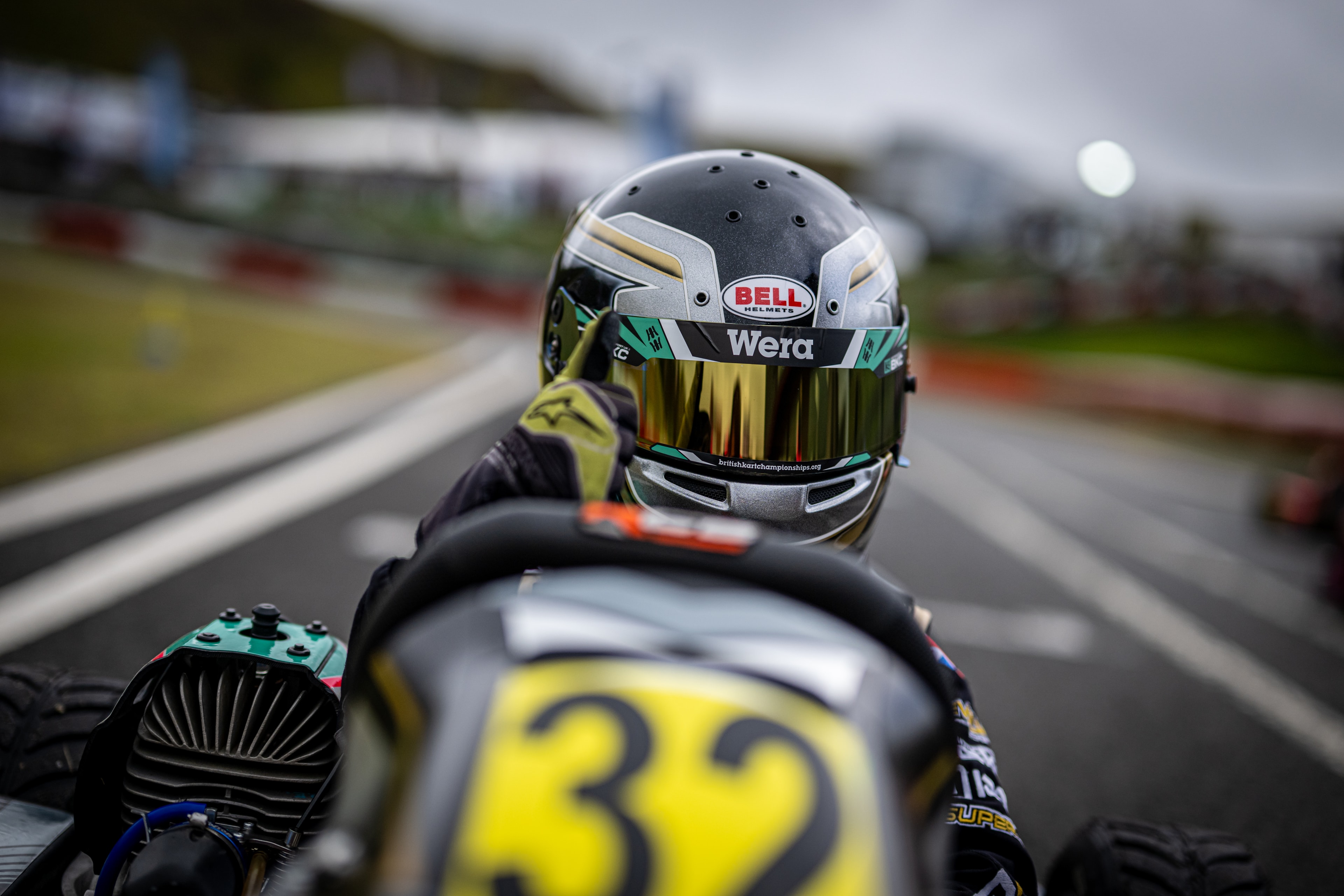 Henry Exton Bell Wera helmet close-up from behind in kart at Rowrah