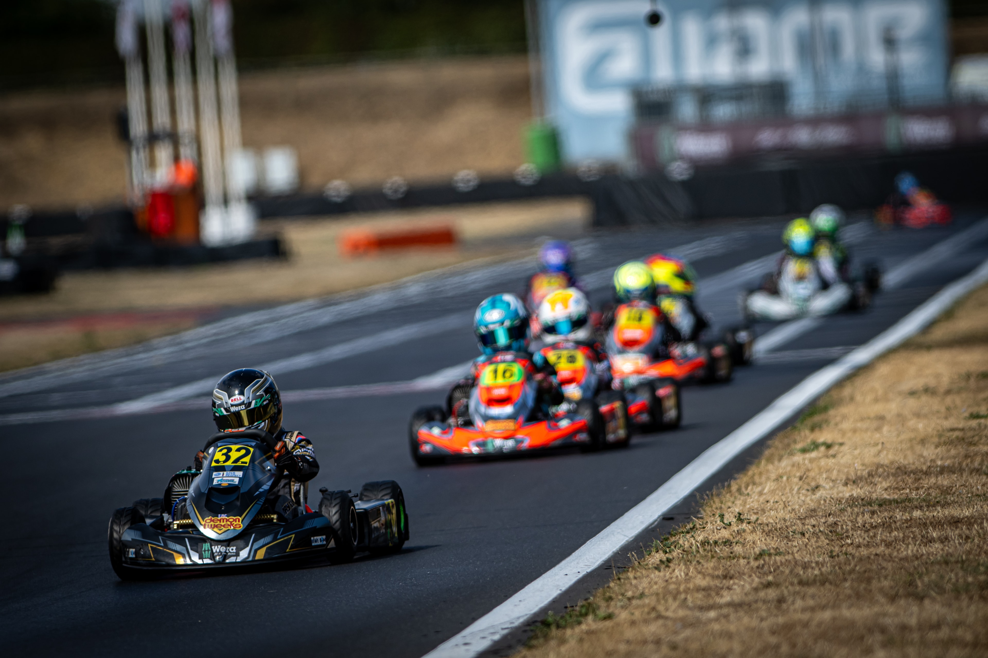 Henry Exton kart number 32 leading the field at PFI