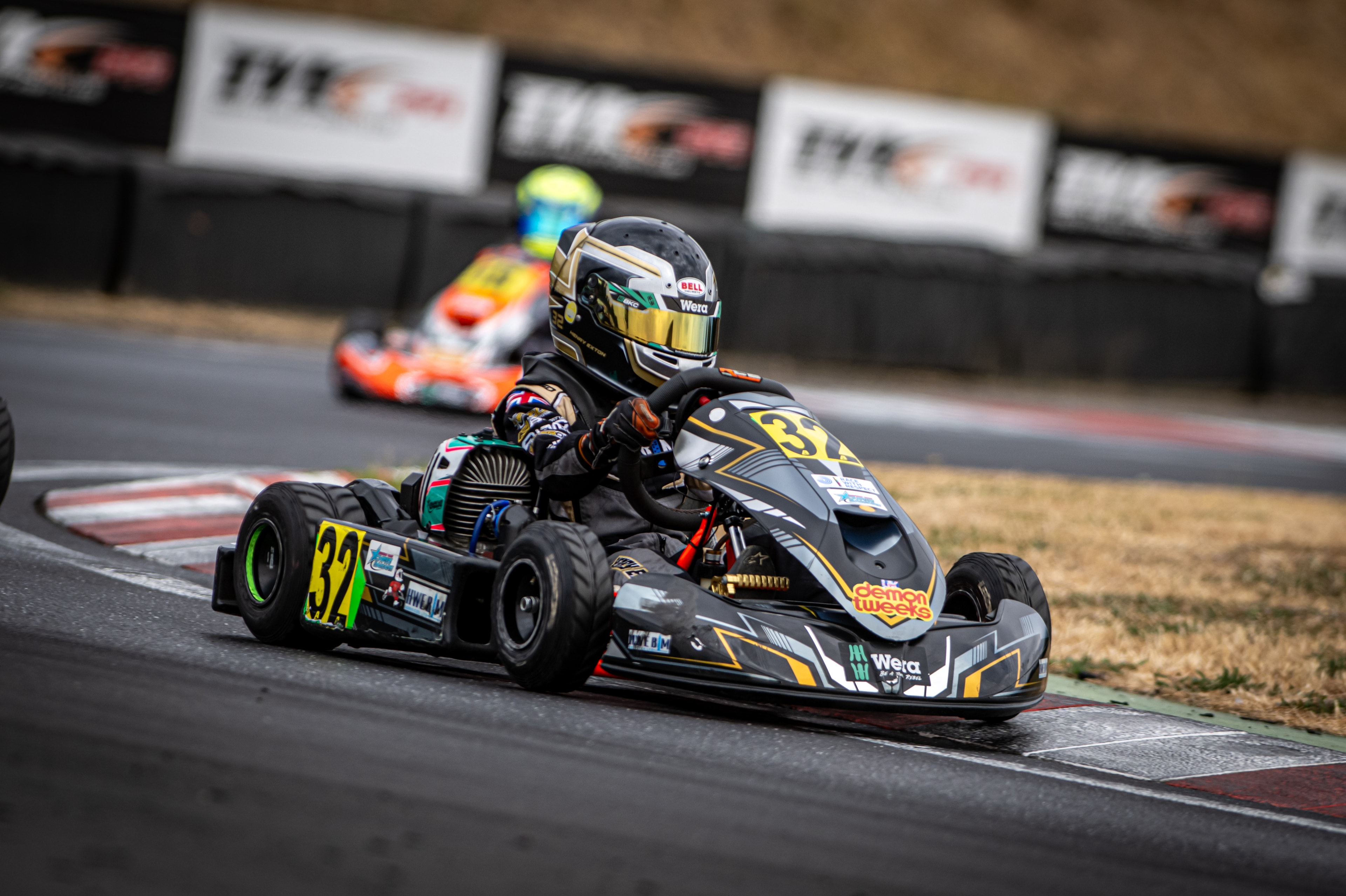 Henry Exton kart number 32 in close racing action at PFI