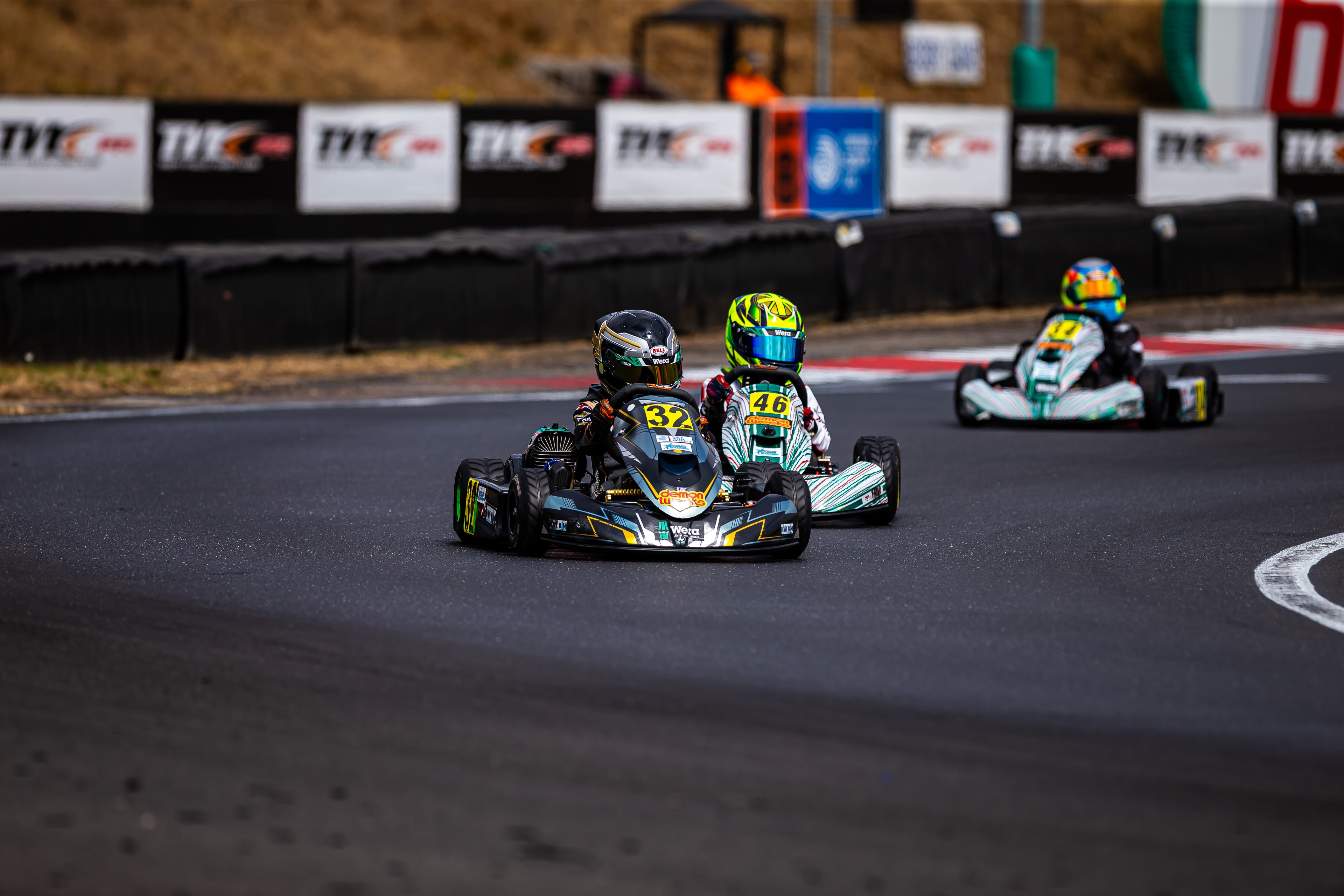 Henry Exton kart number 32 battling at PFI