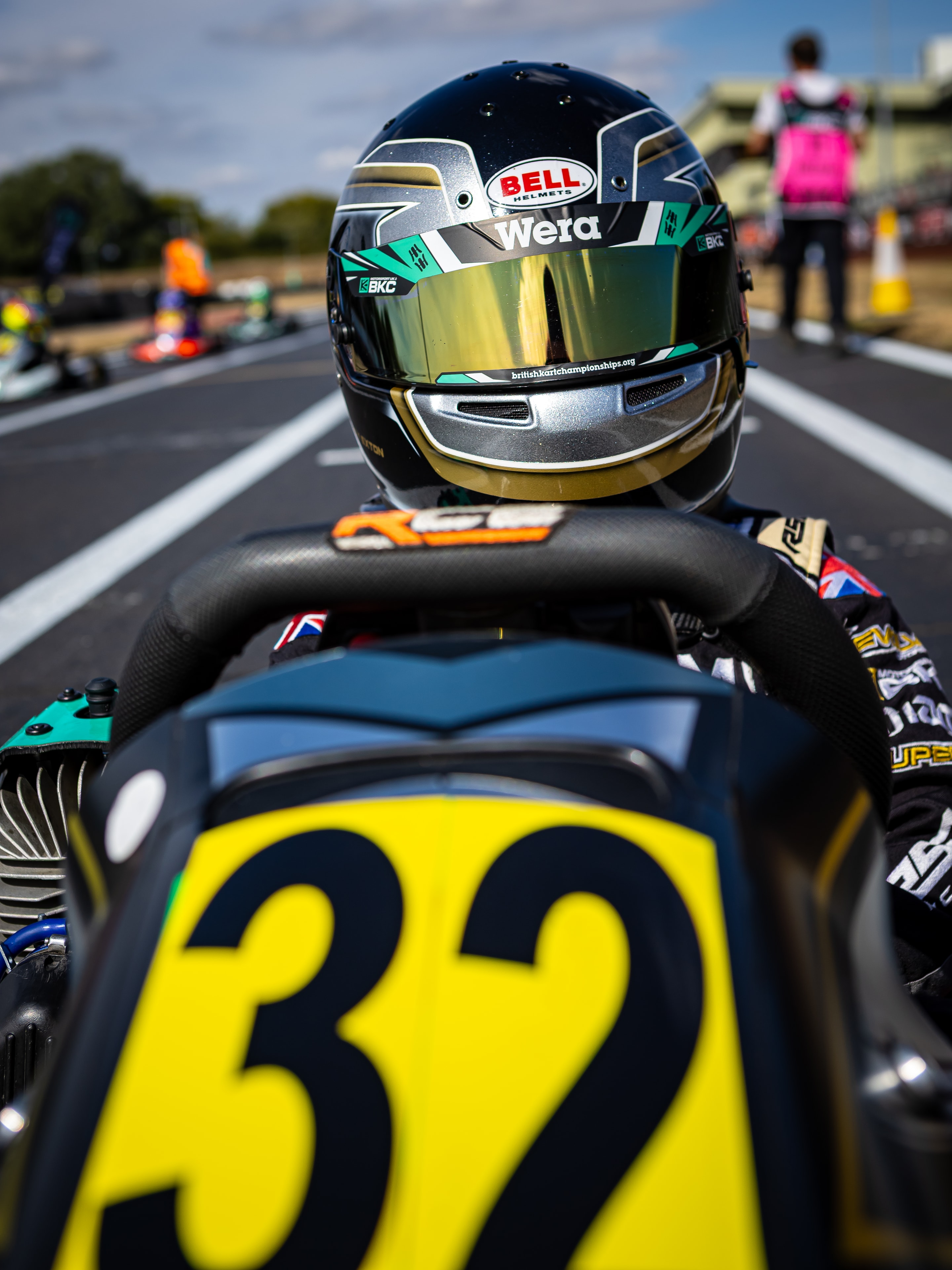 Henry Exton helmet and kart number 32 on the grid at PFI