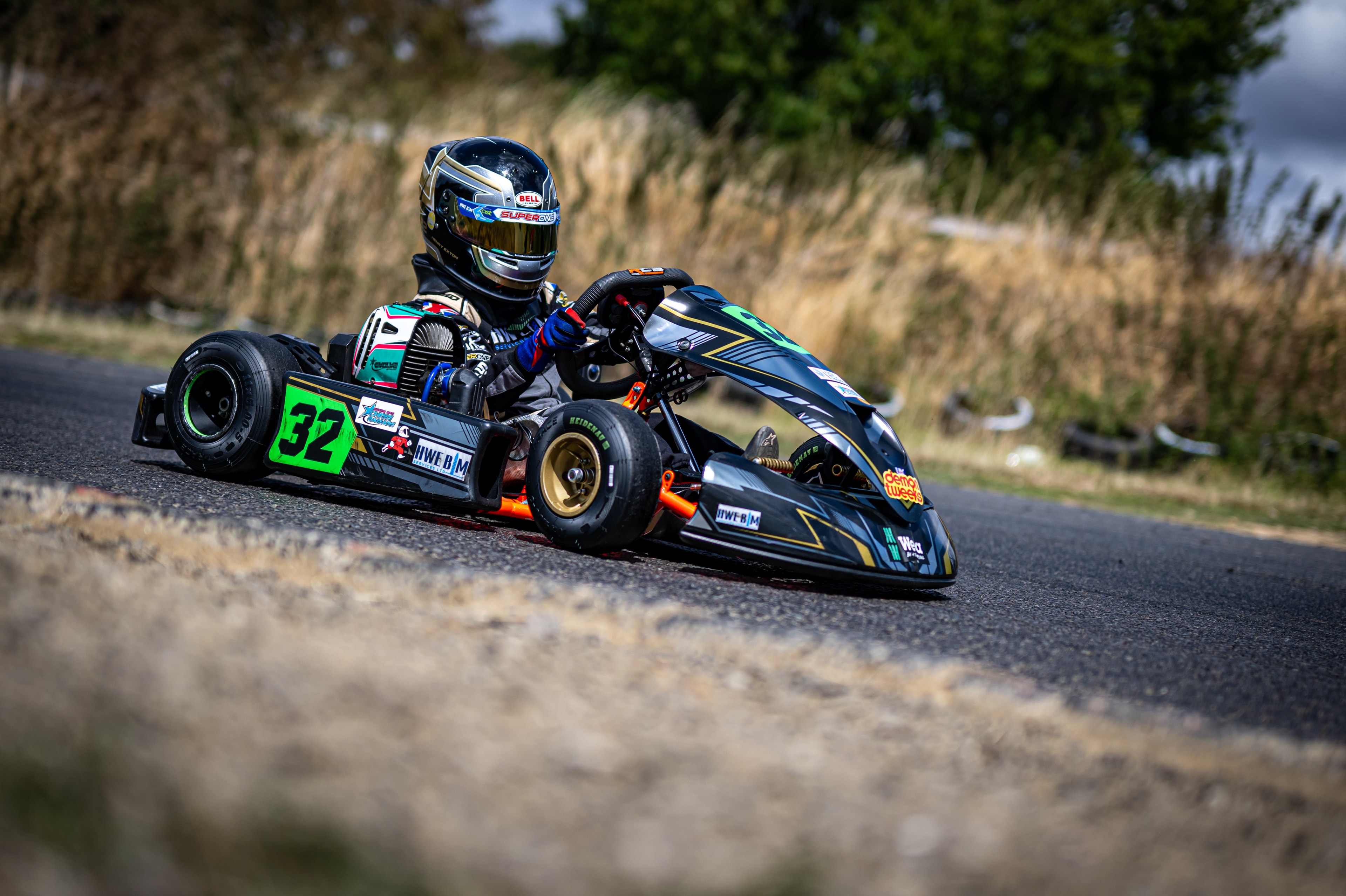 Henry Exton kart number 32 solo on track at Whilton Mill in dry conditions